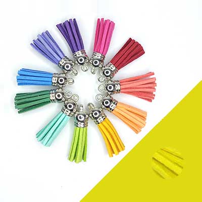 1x Mini kwastje geel suedeleer 37mm